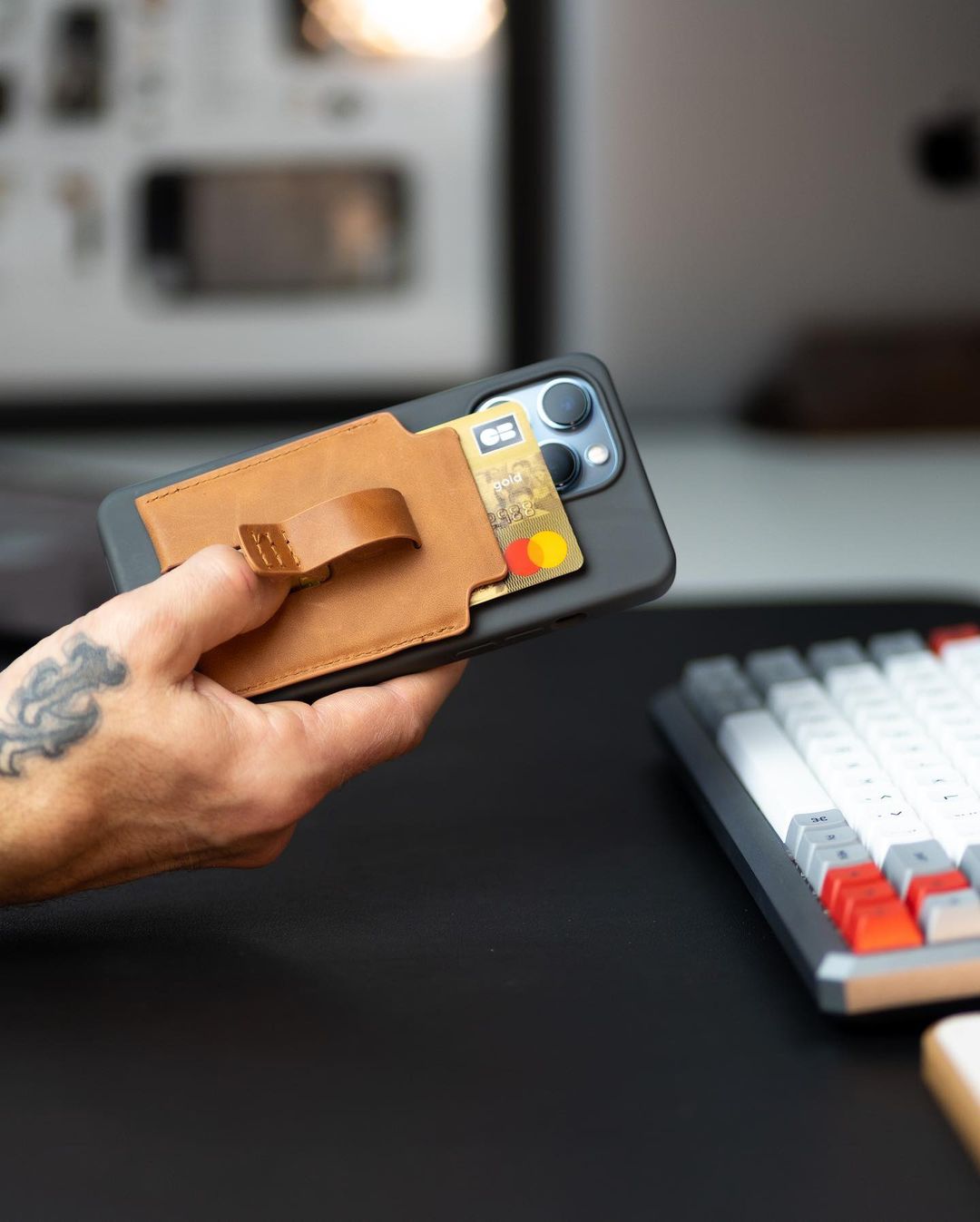 Using finger slot of MagBak wallet to eject credit cards 