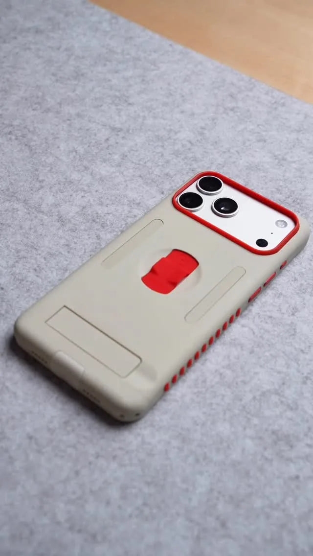 Beige and red MagBak Elite Case for iPhone 17 Pro shown by Jay Daniels