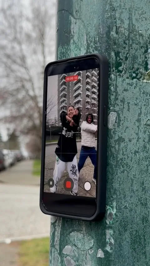 MagBak Elite Case mounted to a metal pole while recording dancers